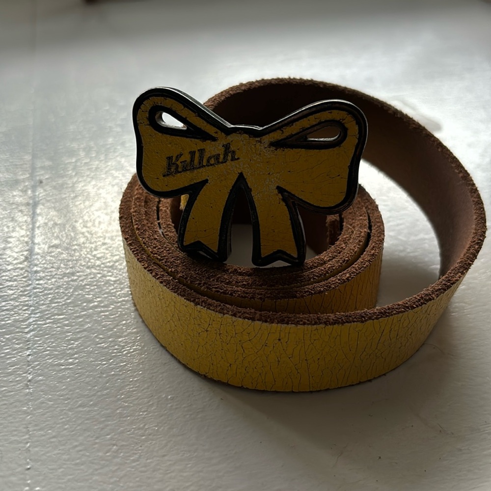 Yellow leather belt.